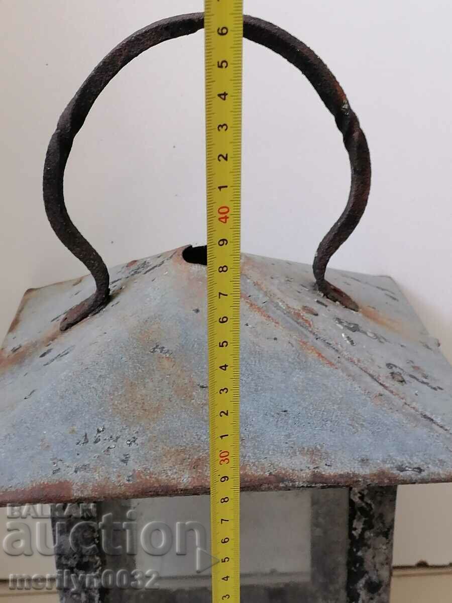 Delivery of Old hand-held lantern, lamp, candela, candlestick, chandelier