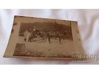 Photo Sergeant men women and children with a donkey cart