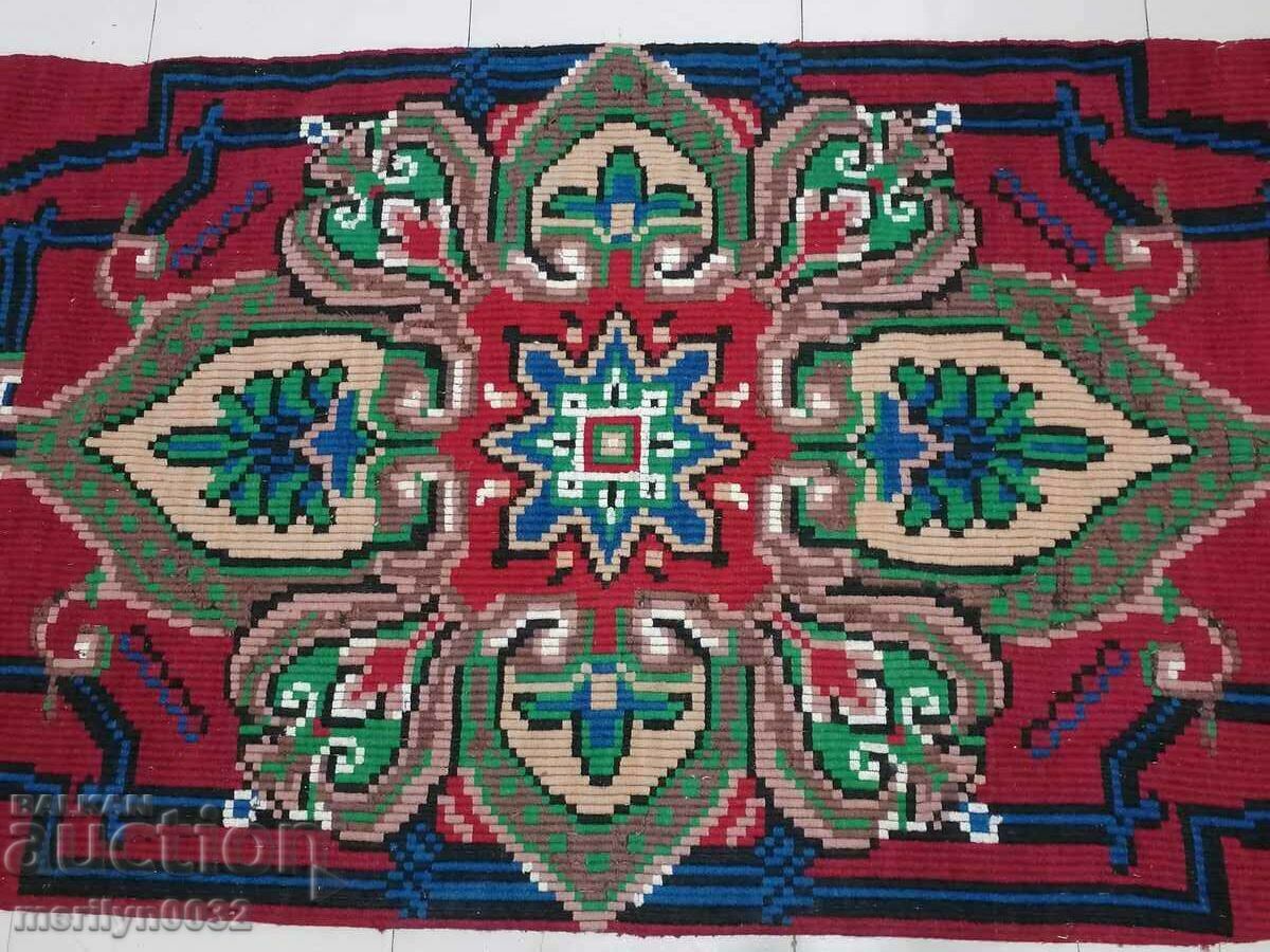 Old handwoven woolen wall carpet, carpet rug