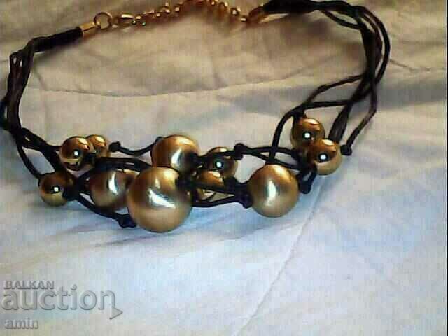 beautiful necklace with gold-plated balls beautiful necklace with gold-plated balls