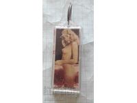 Keychain with naked babe and condom STOP AIDS