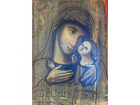 Old Russian hand-painted icon of the Virgin and Child