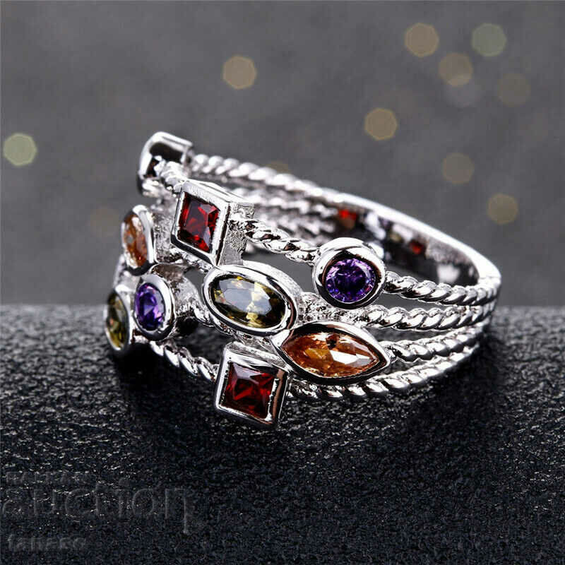 Auction Women's multicolored ring with zircons Auction Women's multicolored ring with zircons