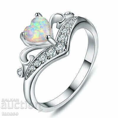 Women's ring with opal and crystals
