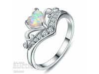 Women's ring with opal and crystals