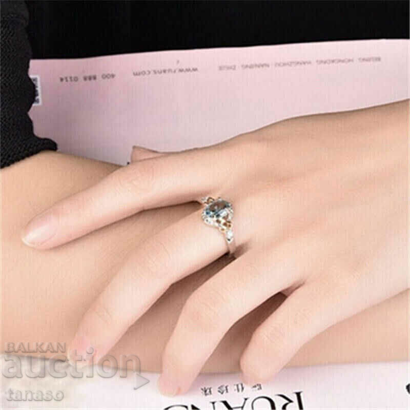 Auction Delicate ladies ring with aquamarine Auction Delicate ladies ring with aquamarine