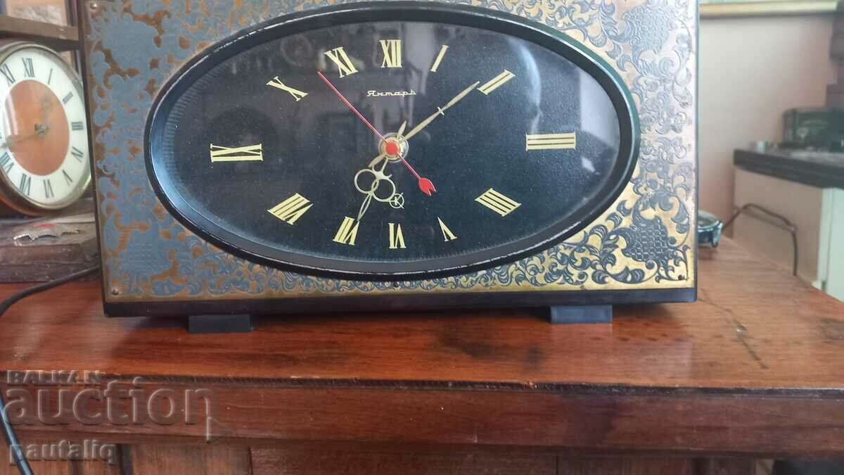 Auction  AMBER TABLE CLOCK
