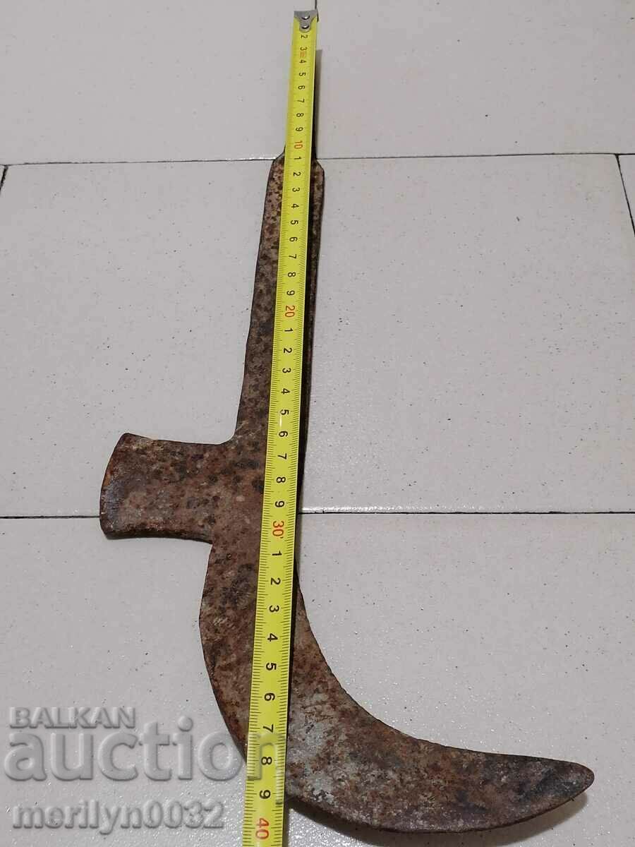 Delivery of An old tool, an instrument, a hand forged cutter, a chopper, a machete Delivery of An old tool, an instrument, a hand forged cutter, a chopper, a machete