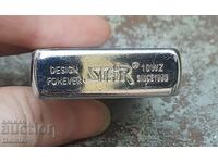 Old petrol lighter STAR