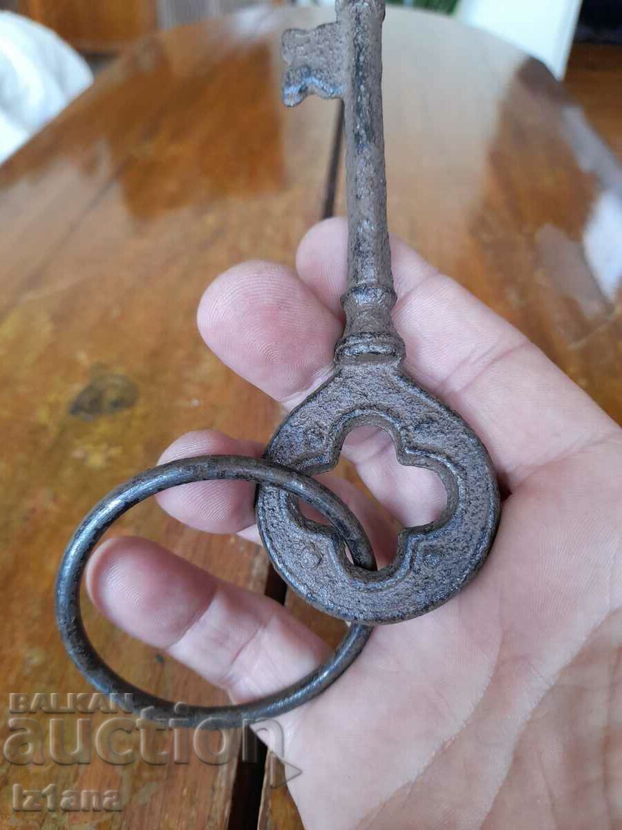 Auction Old metal key Auction Old metal key