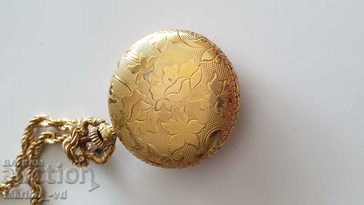 Auction  Women's watch medallion MONDAINE