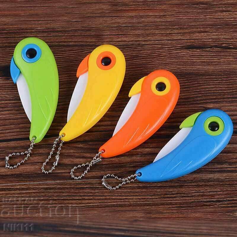 Folding pocket knife bird, parrot, canary Folding pocket knife bird, parrot, canary