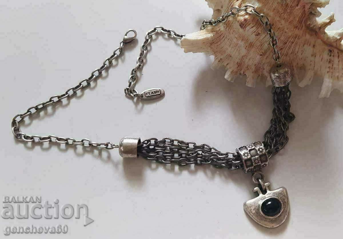 Delivery of FLASH branded necklace with black onyx Delivery of FLASH branded necklace with black onyx