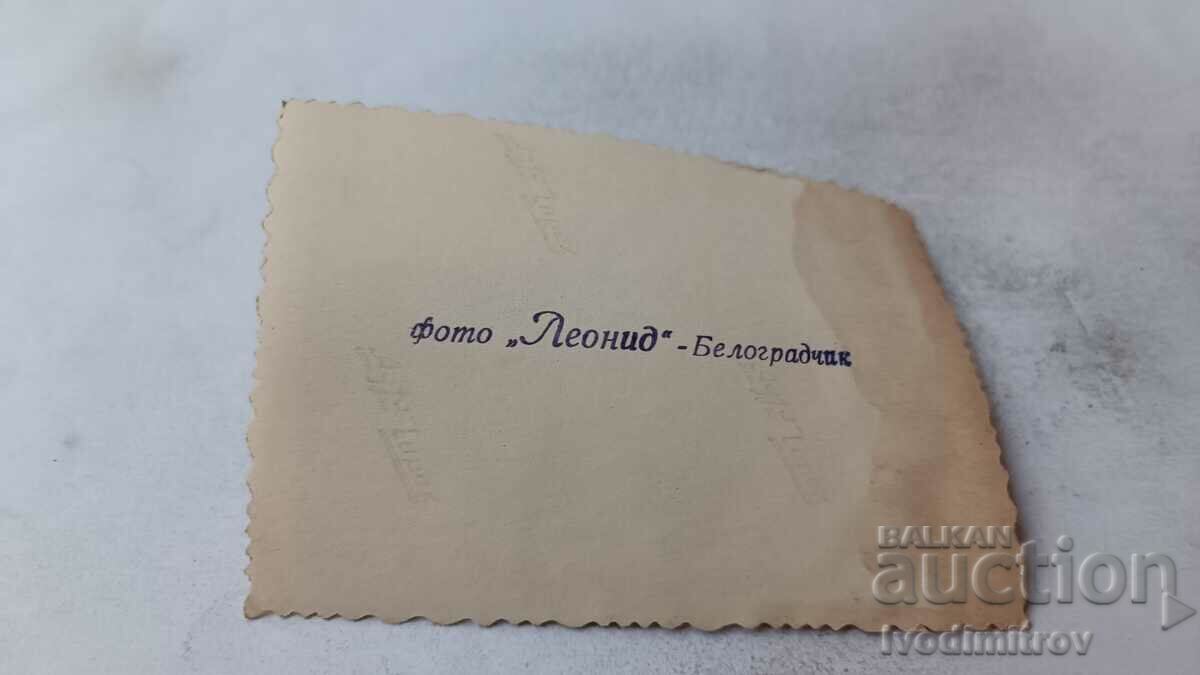 Photo Men in front of a mountain hut with price 2.45 BGN | € 1.25 Photo Men in front of a mountain hut with price 2.45 BGN | € 1.25