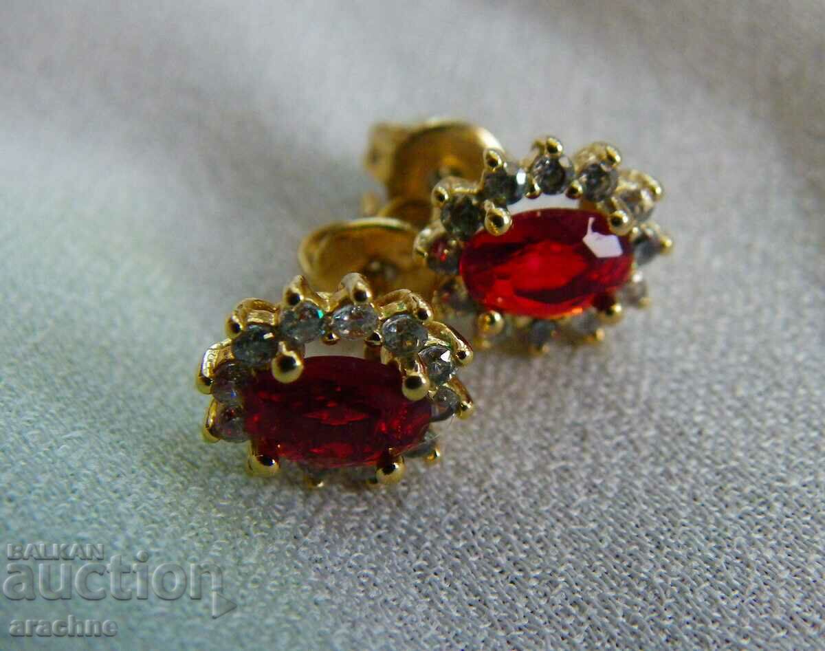 Delivery of Gold plated silver earrings