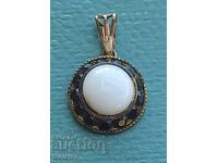 Antique pendant with pearl and black stones
