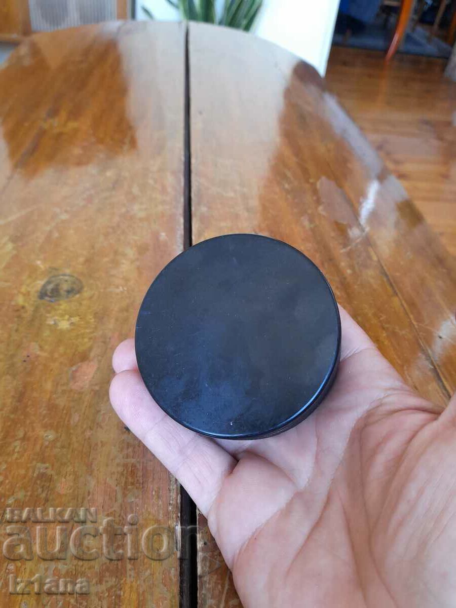 Auction Old hockey puck Auction Old hockey puck