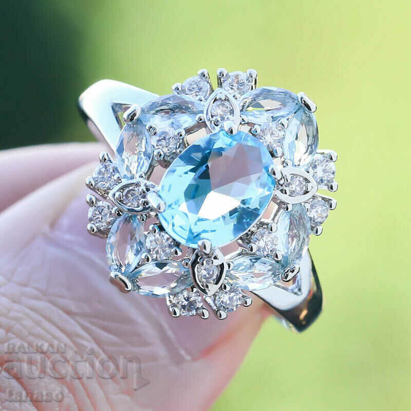 Ring with aquamarine and zircons with price 25.00 BGN | € 12.78 Ring with aquamarine and zircons with price 25.00 BGN | € 12.78