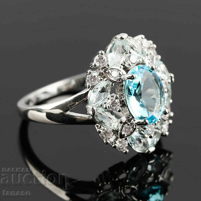 Delivery of Ring with aquamarine and zircons Delivery of Ring with aquamarine and zircons