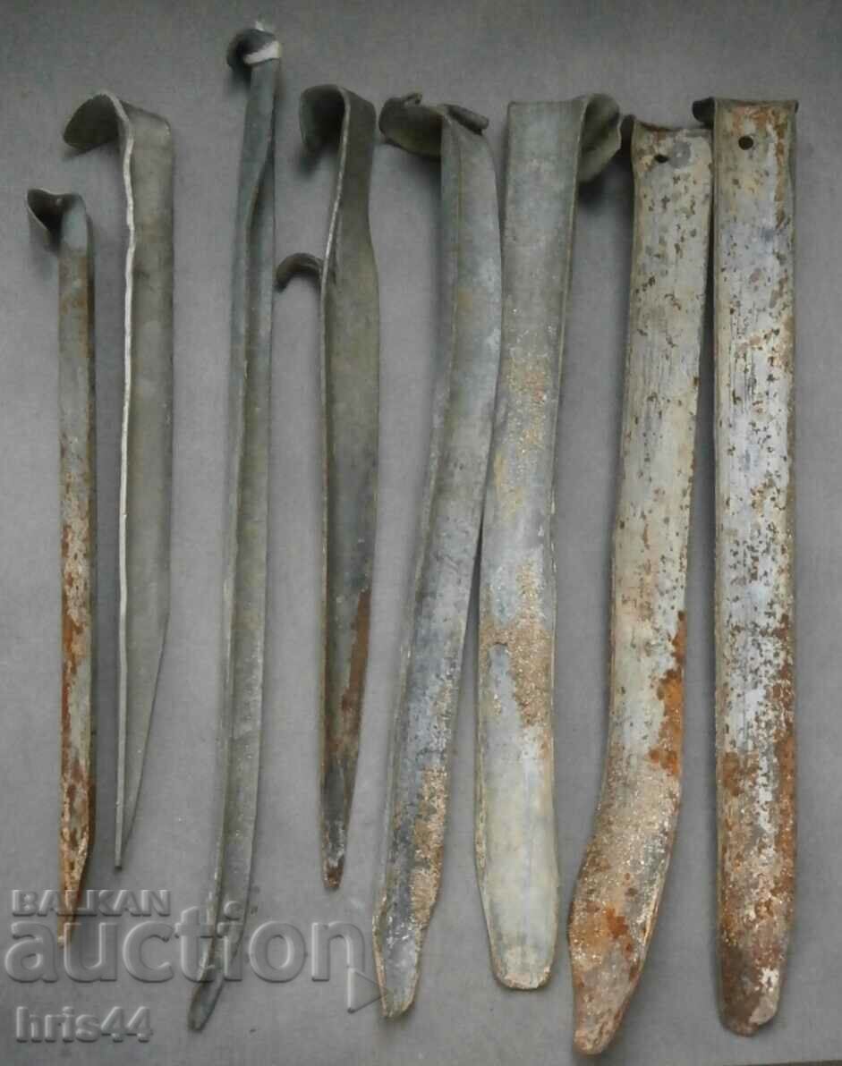 8 pcs. old tent pegs