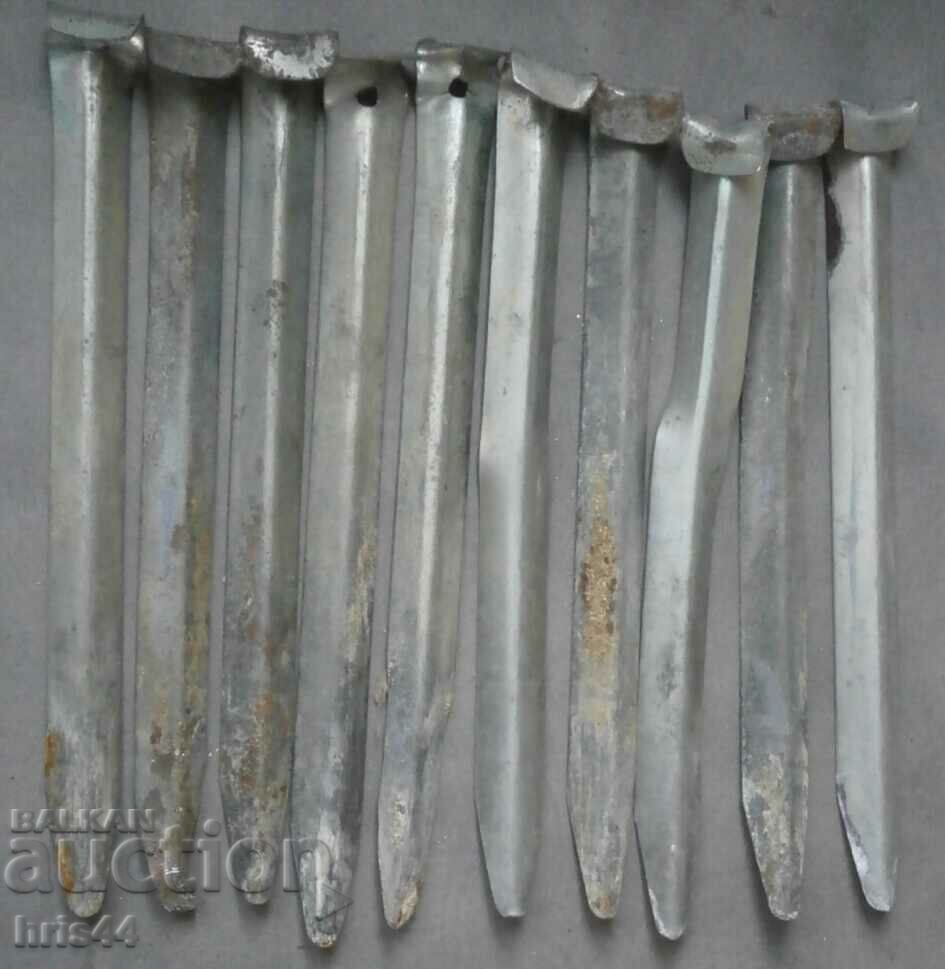 10 pcs. old tent pegs