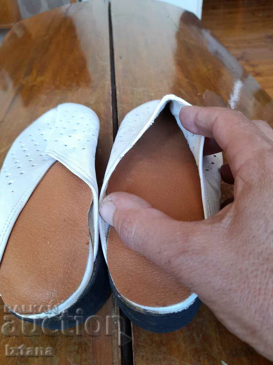 Auction  Old medical sandals, slippers, shoes