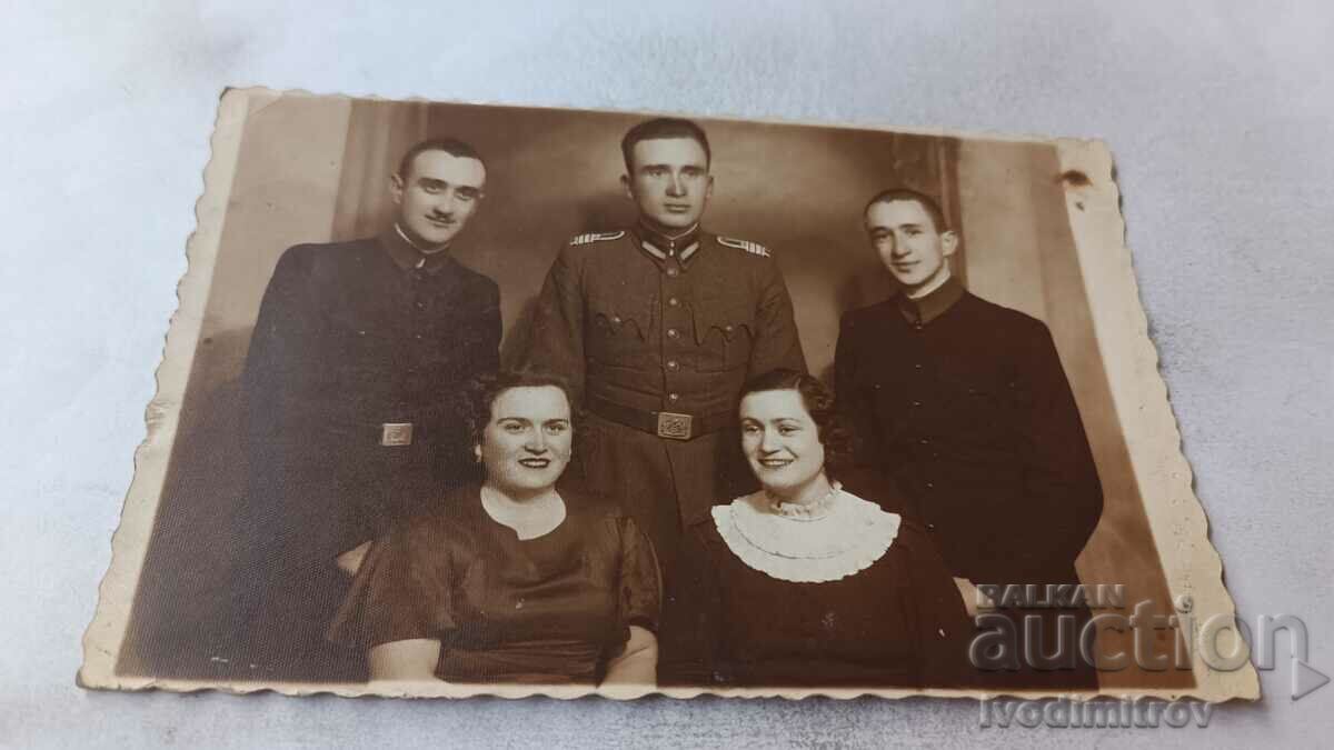 Photo Sergeant two men and two women