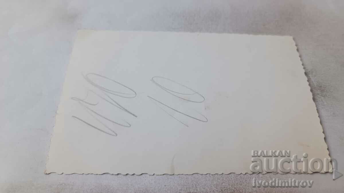 Photo Sofia A man and a woman in front of the Mausoleum of G. Dimitrov with price 1.45 BGN | € 0.74