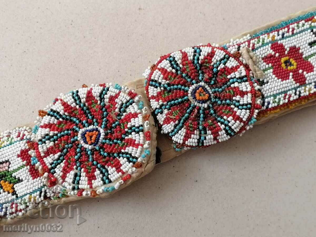 Auction Beaded belt, beaded cuffs, early 20th century Auction Beaded belt, beaded cuffs, early 20th century
