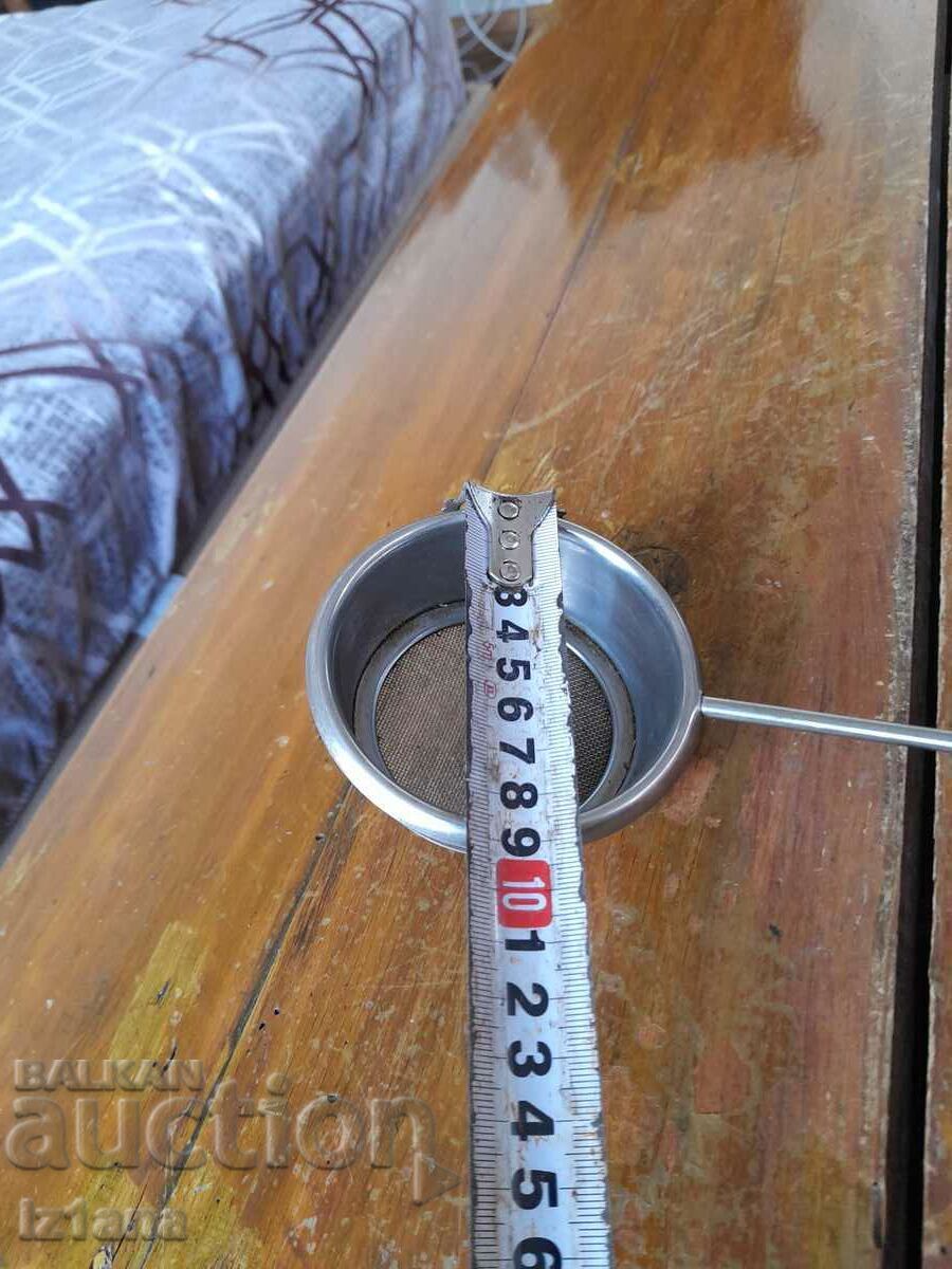 Auction An old kitchen strainer Auction An old kitchen strainer