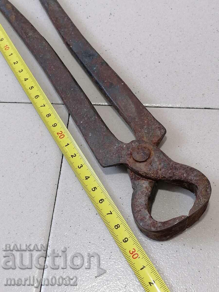 Auction Old tongs, wrought iron, tool corpen Auction Old tongs, wrought iron, tool corpen