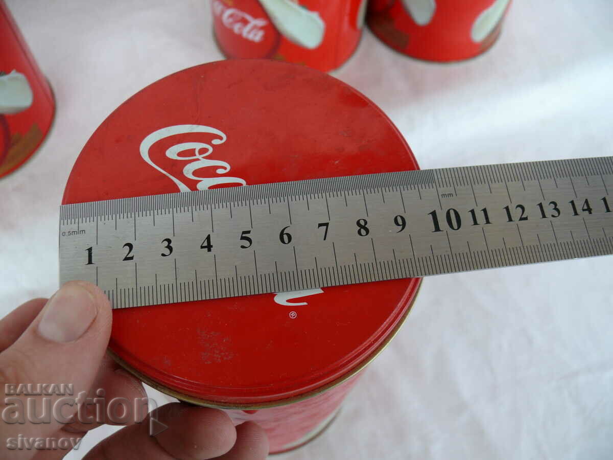 Interesting set of 4 metal Coca Cola cans #1539 - 7 Interesting set of 4 metal Coca Cola cans #1539 - 7