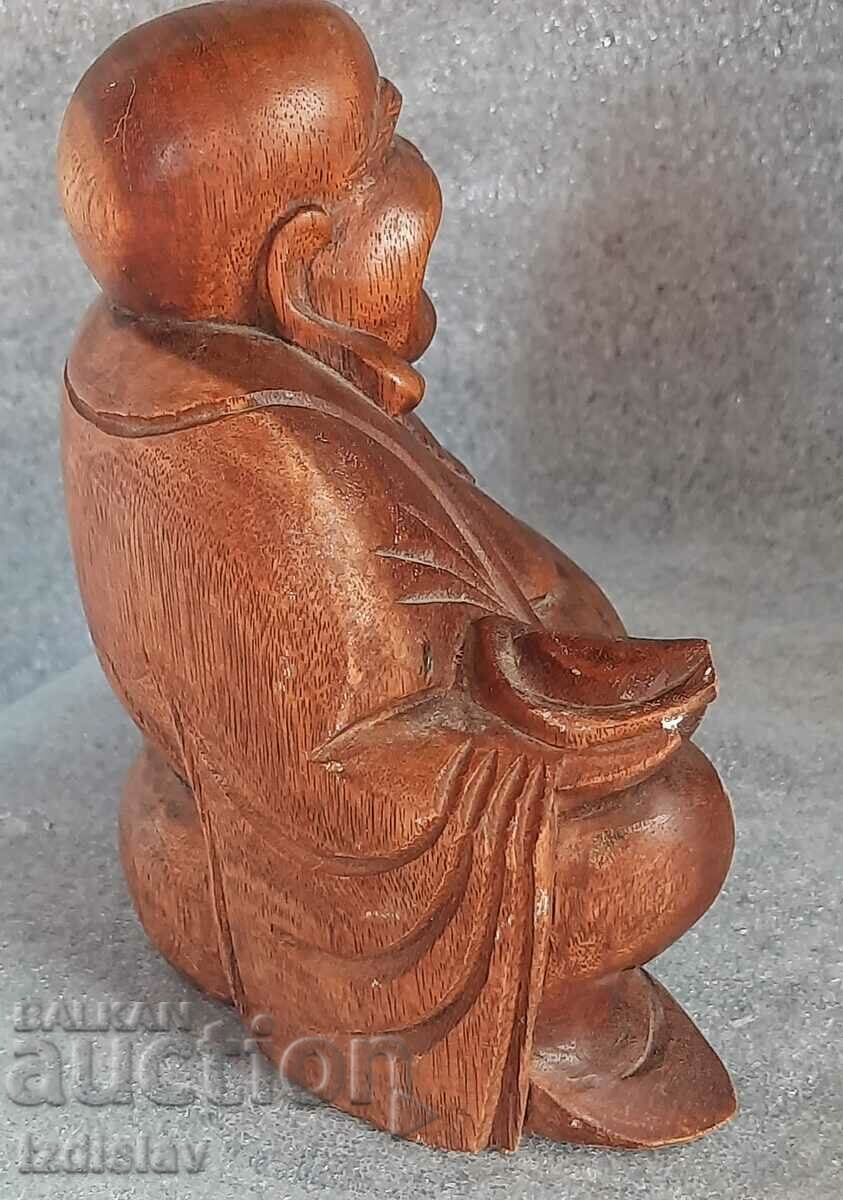 Auction Wooden statue of the happy laughing Buddha Auction Wooden statue of the happy laughing Buddha