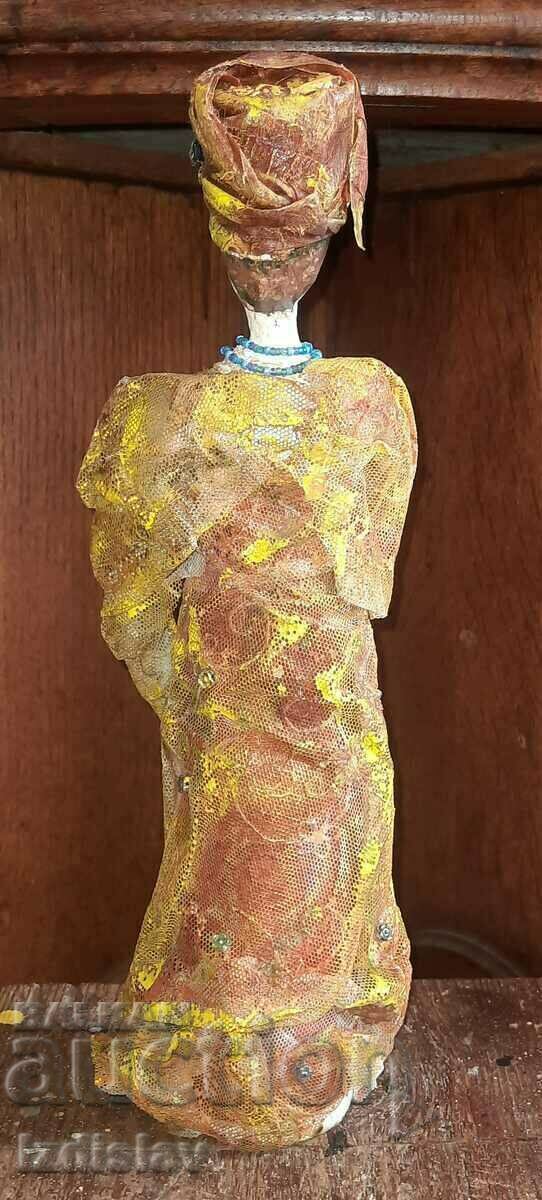 Delivery of Vintage papier-mâché doll