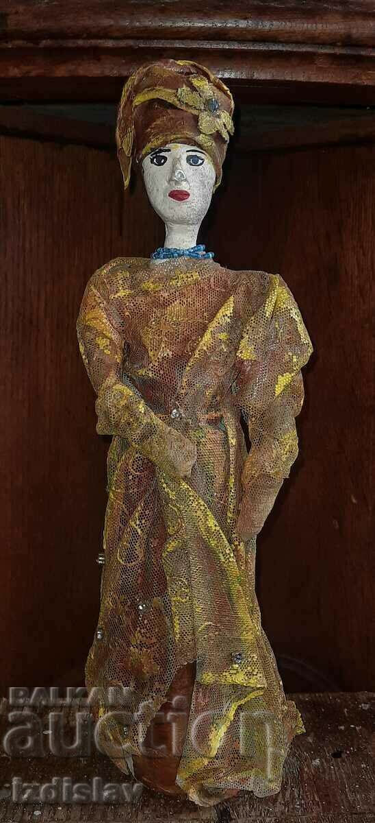 Vintage papier-mâché doll