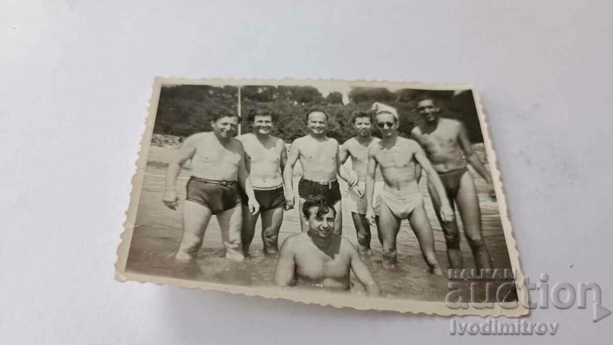 Φωτογραφία Άνδρες στην παραλία