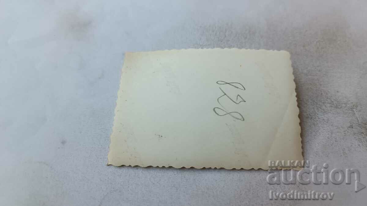 Photo Two men on a cliff above the sea with price 2.35 BGN | € 1.20