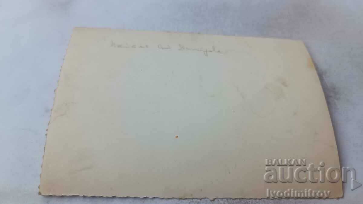 Photo Men and women in front of a rest station with price 1.45 BGN | € 0.74