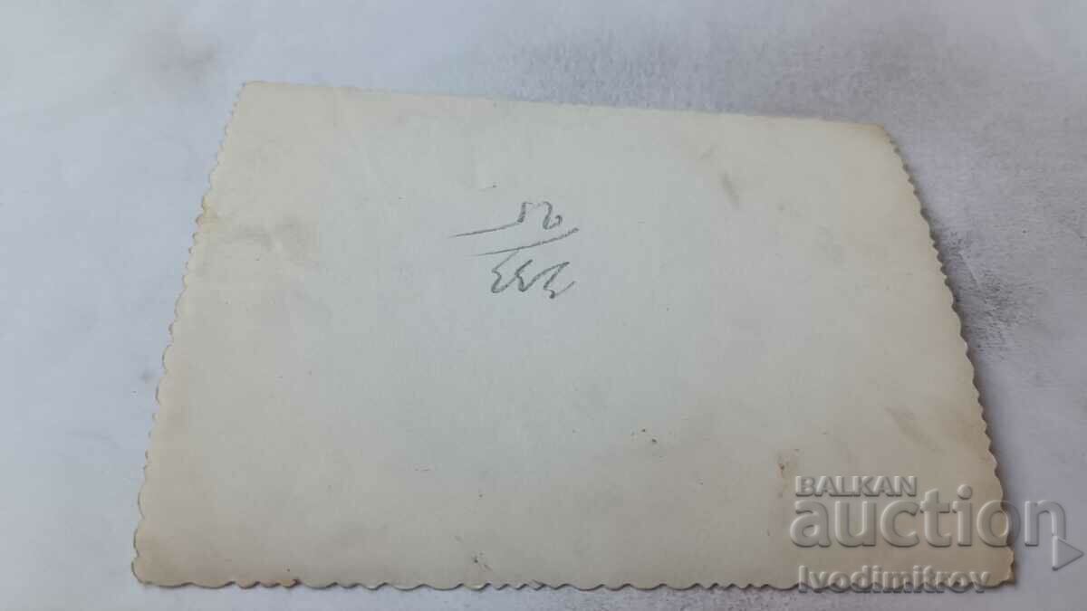 Picture Men and women having a drink at a table with price 1.35 BGN | € 0.69 Picture Men and women having a drink at a table with price 1.35 BGN | € 0.69