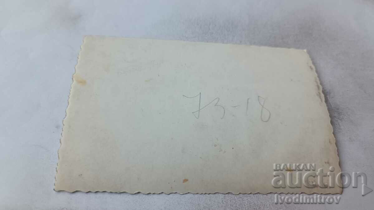 Picture Men and women having a drink at a table with price 1.65 BGN | € 0.84 Picture Men and women having a drink at a table with price 1.65 BGN | € 0.84