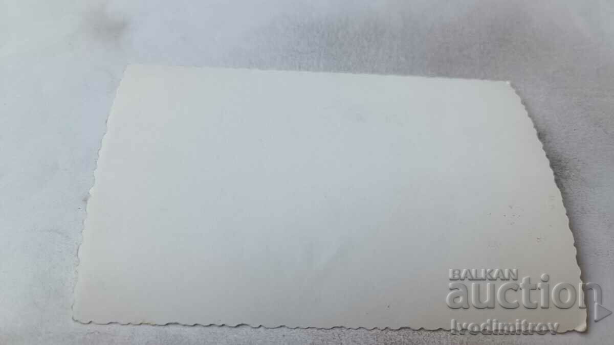 Photo Sofia Men and women in folk costumes dance a dance with price 1.65 BGN | € 0.84