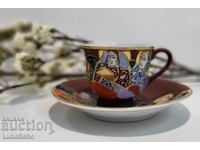 Japanese porcelain Satsuma Moriage coffee cup and saucer.