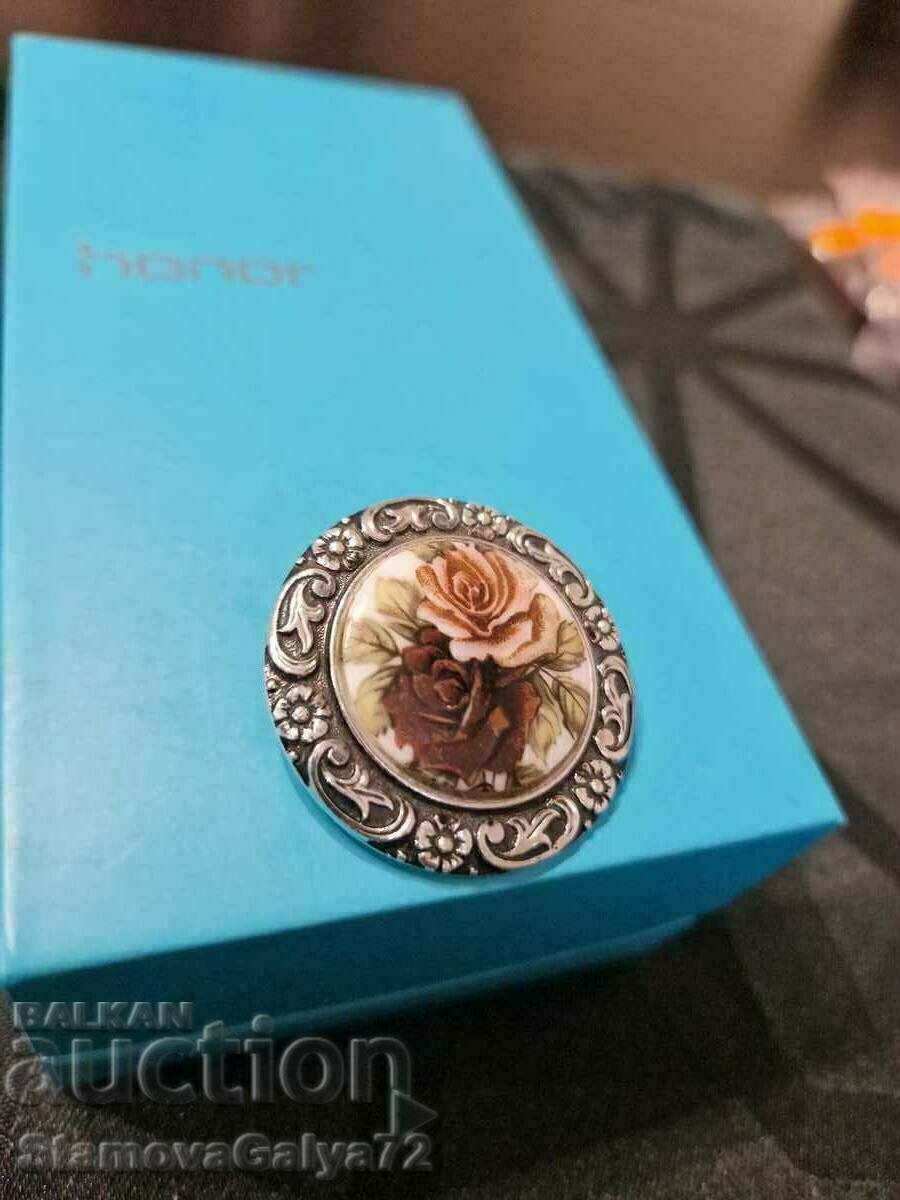 Delivery of A wonderful antique collectible porcelain brooch