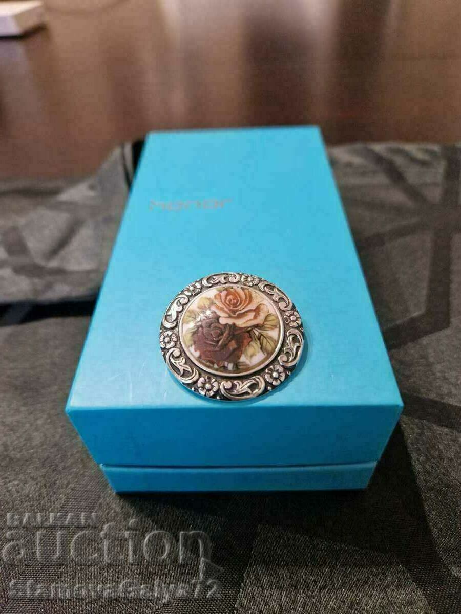 A wonderful antique collectible porcelain brooch