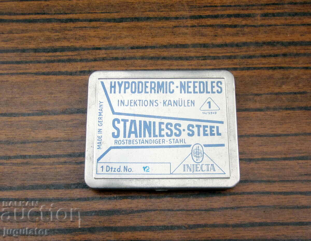 unused old German medical needles in a box
