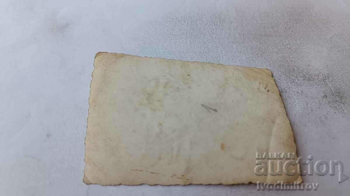 Photo Sofia Three men in front of a shop with price 1.65 BGN | € 0.84 Photo Sofia Three men in front of a shop with price 1.65 BGN | € 0.84