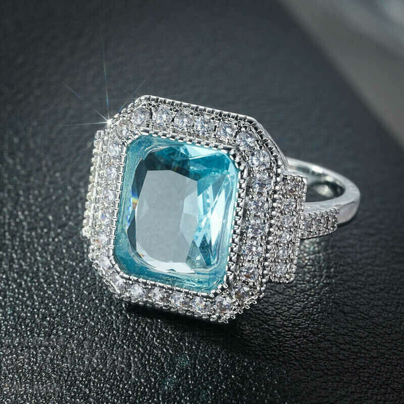 Auction  Ring with aquamarine and zircons