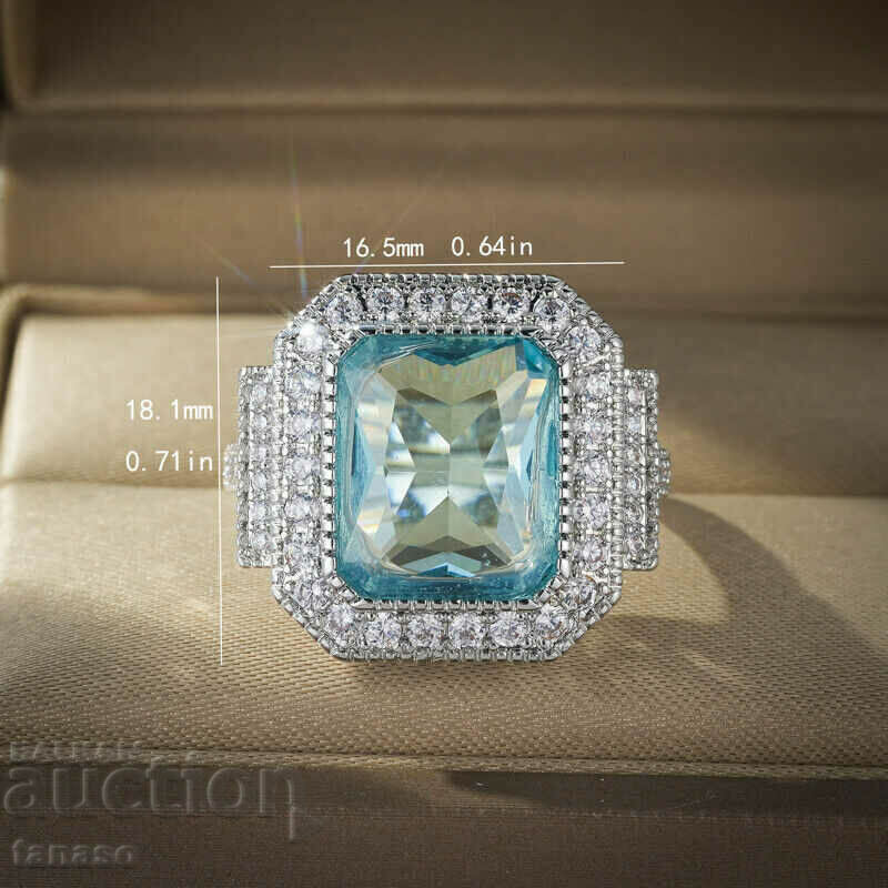 Delivery of Ring with aquamarine and zircons