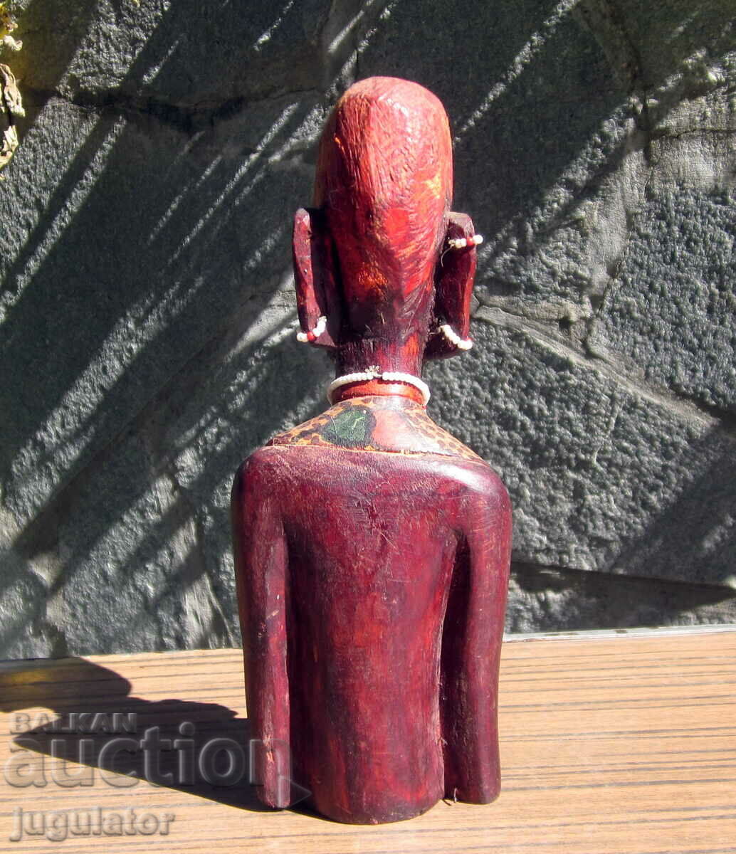 Delivery of old wooden figure statuette bust of a naked woman