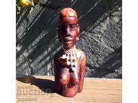 old wooden figure statuette bust of a naked woman